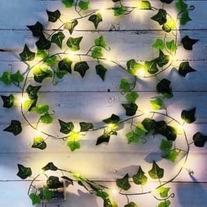 Artificial green plant leaf lights with LED bulbs that give a natural and warm atmosphere to the home