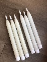 Safe battery-operated decorative candles for decorating tables and Ramadan gatherings