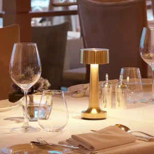 Gold wireless LED table lamp with an elegant design